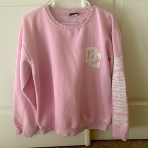 Good condition pink Washington DC sweatshirt. Size Women’s Large